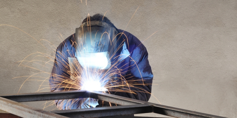 SOURCETECH welder fabricating steel and aluminum components in contract manufacturing process.